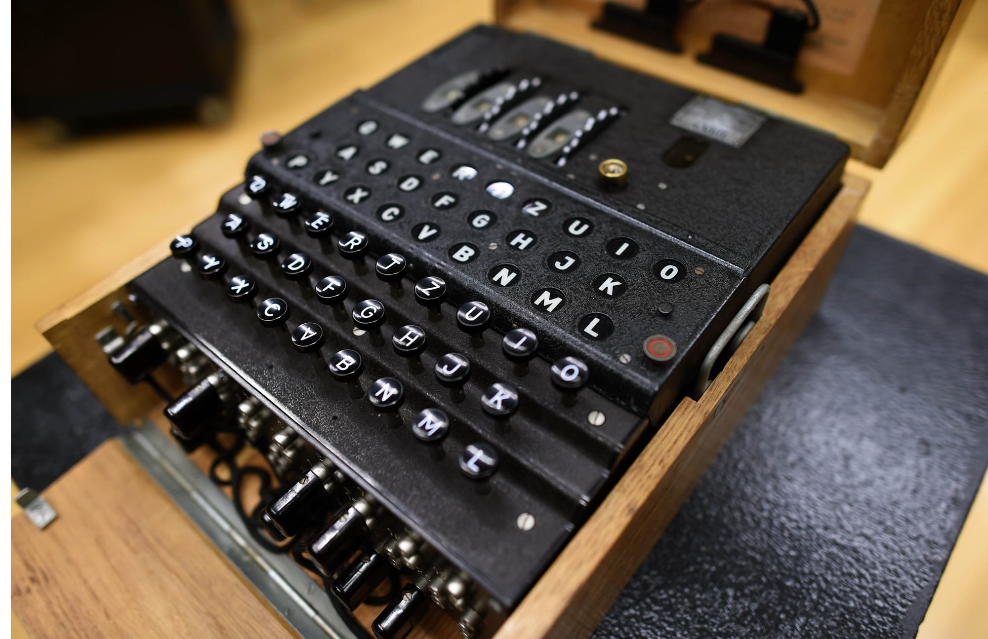 A rare and fully-functional German Naval four-rotor Enigma enciphering machine (M4), is viewed at Bonhams New York on October 22, 2015.  The machine that headlined the auction "Conflicts of the 20th Century" at Bonhams New York on October 21, sold for for $365,000 USD including premium which set a world-record.  Representing the scarcest of the German enigma machines, the M4 was built in 1943-45and up to 150 machines survived from the approximately 1,500 built.   AFP PHOTO / TIMOTHY A. CLARY