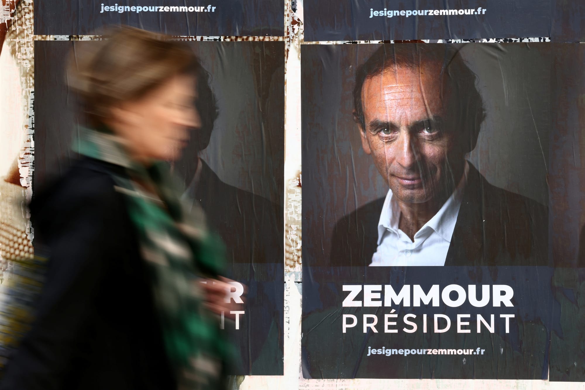 In France, right-wing maverick's young supporters campaign to cheers and jeers | Reuters