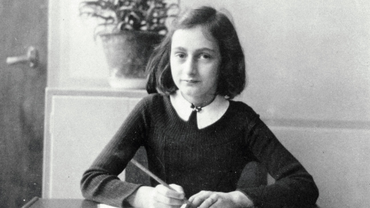 Mandatory Credit: Photo by Universal History Archive/Universal Images Group/Rex/REX USA (1532967a) Anne Frank's (1929-1945) world famous diary charts two years of her life from 1942 to 1944, when her family were hiding in Amsterdam from German Nazis. The diary begins just before the family retreated into their 'Secret Annexe'. History