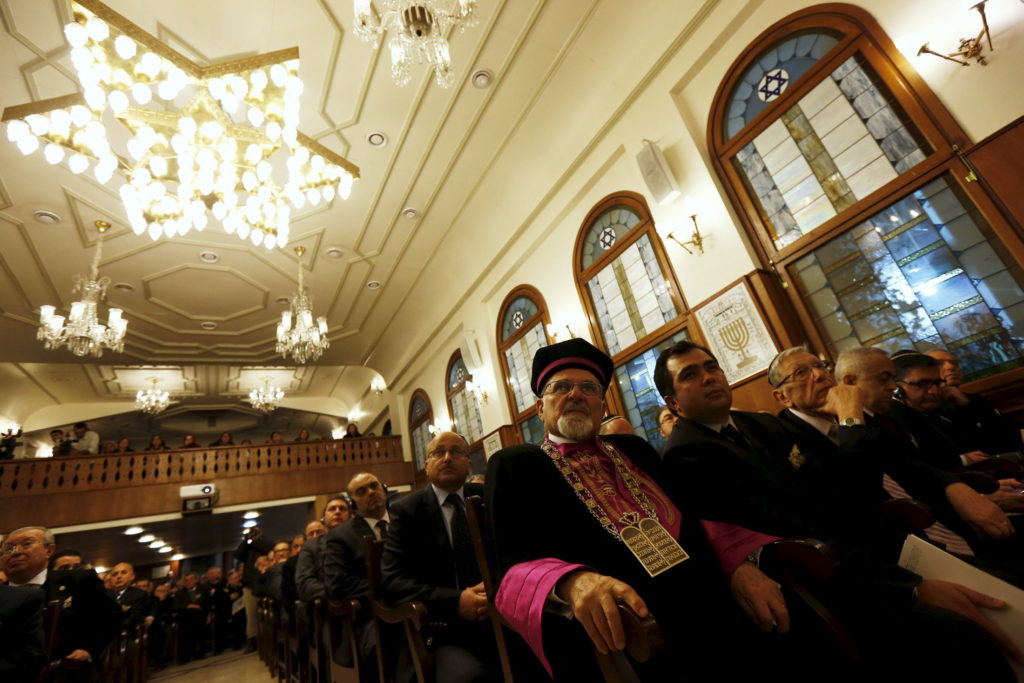 Members of Turkey's Jewish community gather at Etz Ahayim Synagogue to commemorate International Holocaust Remembrance Day in Istanbul January 27, 2013. The International Day of Commemoration, which was designated by the United Nations General Assembly to honour Holocaust victims, occurs annually on January 27. REUTERS/Murad Sezer (TURKEY - Tags: POLITICS RELIGION ANNIVERSARY)